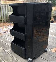 Front view showing three open shelves and overall structure