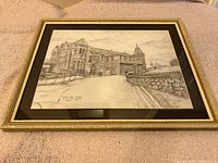 Full view of the framed pencil sketch of Bolton Royal Infirmary showing the entire building and driveway.