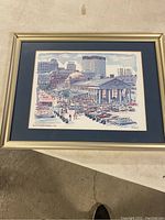 Framed art print depicting Boston's Faneuil Hall with vintage cars and people, signed R.E. Kennedy