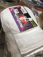 White Morphsuits masks in packaging showing label and brand.