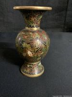 Front view of one cloisonné vase showing floral pattern and intact condition