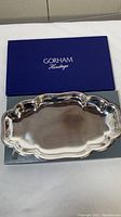 Full view of the Gorham Heritage silver serving plate with original blue presentation box beneath.