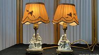 Both lamps lit on display showing overall appearance and scale
