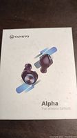 Front photo of the Vankyo Alpha X180 wireless earbuds box showing product image and branding.
