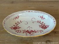 Full top view of the Meissen porcelain bowl showing the pink Indian floral pattern and gold rim