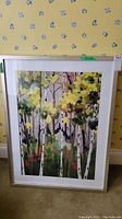 Front view of framed art print with birch trees, showcasing the colors and frame condition