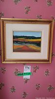 Framed original signed landscape painting on board, gold frame and white matting