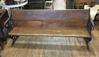 Front view of the solid wood church pew showing the wooden seat and backrest, 6 feet long.