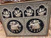 Full view of the large East Indian beaded and embroidered textile art piece with multiple deity figures and elephants, framed.