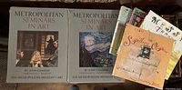 Two vintage Metropolitan Seminars in Art books with loose prints and visible art covers