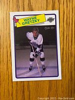 Front of 1988-89 O-Pee-Chee Wayne Gretzky hockey card showing player in Los Angeles Kings jersey.