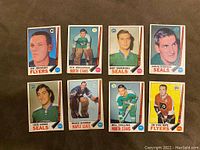 Fronts of eight 1969-70 O-Pee-Chee hockey cards showing player images and team logos.