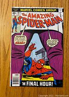 Front cover of The Amazing Spider-Man #164 comic showing Spider-Man trapped and title text