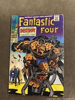 Front cover of Fantastic Four #68 comic book showing cover art and price details.