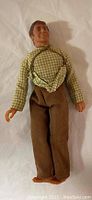 Full front view of Pop Walton 1970s Mego action figure showing detailed clothing and facial features.