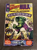 Front cover of Tales To Astonish #75 comic book showing The Incredible Hulk and Sub-Mariner with bold colorful text and artwork.