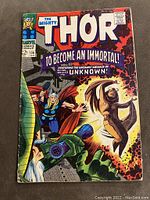 Front cover of The Mighty Thor comic book issue #136 with artwork and title visible.
