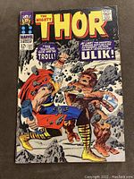 Front cover of the comic displaying Thor fighting Ulik with price 12¢ and issue #137.