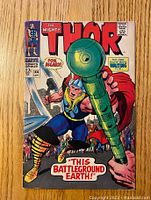 Front cover image of The Mighty Thor #144 comic book showing Thor in battle.