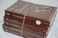 Five sealed "Great Courses" books in original plastic wrap, brown covers with titles and medieval-themed illustrations, stacked and bundled with rubber band