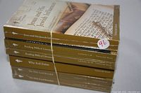 Stack of 6 Great Courses academic lecture series books with gold spines, each labeled with title and transcript volume number, all sealed in original wrappers.
