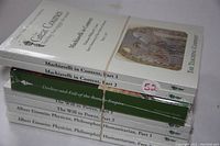 Stack of 7 original sealed lecture series books showing titles and volumes on spines.