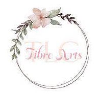 Photo of the gift certificate showing the TLC Fibre Arts logo with floral wreath and script text.