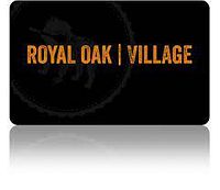 Black Village Restaurant gift card with orange text, 'ROYAL OAK | VILLAGE'.
