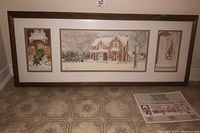 Framed set of three Walter Campbell winter scene prints with certificate laid out on floor