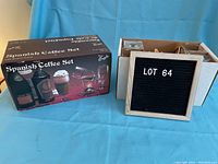 Box and inner packaging of Spanish Coffee Set by Anglo, includes images of glasses, bottles, and burner on front label.