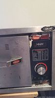 Front view of the Hatco drawer warmer showing temperature control dial, on/off switch and manufacturer label.