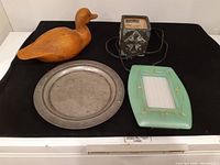 The four items displayed on a white surface for full lot overview