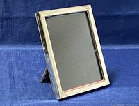 Front angled view of vintage sterling silver photo frame