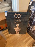 Framed poster showing the full 60th Annual Academy Awards design and frame.