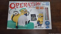 Box front showing Operation game with Minion character and branding