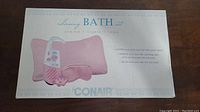 Box showing picture and details of CONAIR Relaxing Bath Set including all items