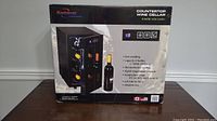 Box of Koolatron Urban Series countertop 8-bottle wine cellar cooler showing product image and specifications.