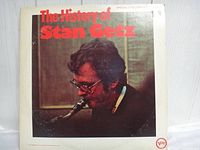 Front cover of The History of Stan Getz album showing Stan Getz playing saxophone, with red and white text and Verve logo.