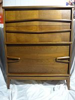 Front view of dresser showing four drawers and integrated handles
