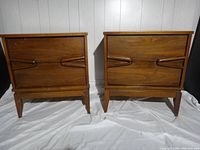 Front view of both nightstands side by side on backdrop