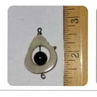 Pendant with ruler showing size approximately 1 inch