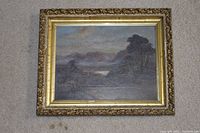 Front view of framed oil painting