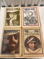 Four vintage Rolling Stone magazine covers from 1973, featuring varied cover art including a woman, caricature, and two men.