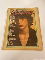 Front cover photo showing Paul Getty on the magazine cover with notable aging on edges.