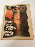 Front cover of the 1974 Rolling Stone magazine featuring Maria Muldaur with article headlines visible.