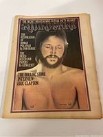 Front cover of 1974 Rolling Stone Magazine featuring Eric Clapton shirtless with eyes closed.