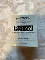 Photo of unopened Baebody Retinol face cream box showing product name, benefits, and key ingredients.