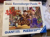 Box of Toy Story Ravensburger 60-piece giant floor puzzle showing front artwork with characters and piece count.