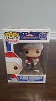 Front view of Clark Griswold Funko Pop in original box.