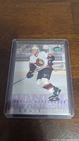 Front side of Daniel Alfredsson rookie card showing him skating in Ottawa Senators uniform, labeled 'ROOKIE' and 'Daniel Alfredsson'